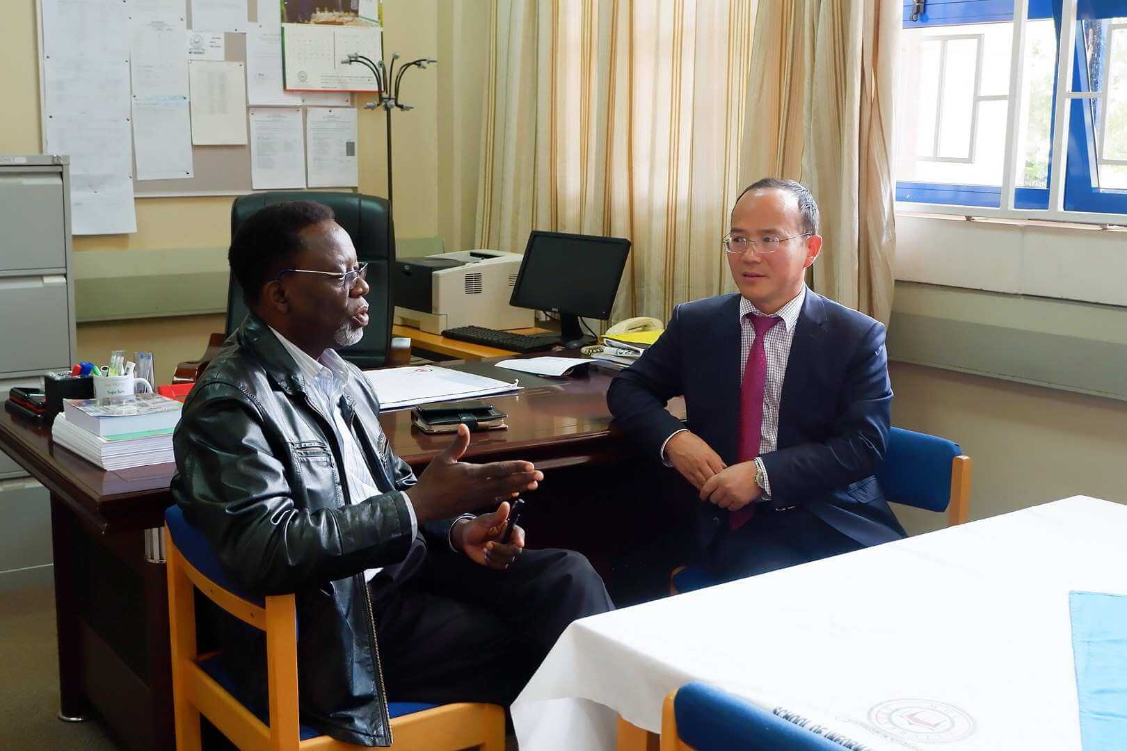 The Confucius Institute Director Prof. Huang Peixi with the Dean of School of Information